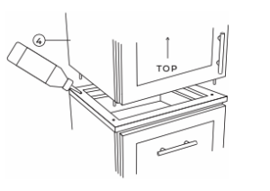 A diagram showing how to place upper linen tower unit on lower unit.