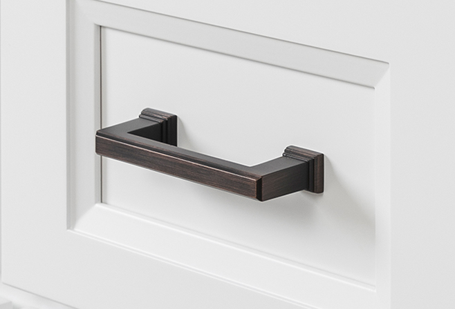 A close up of a drawer with an Oil Rubbed Bronze handle.